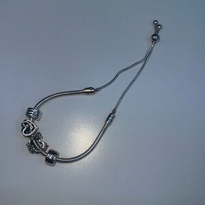 Pandora Bracelet 2 heart charms and 2 clip charms